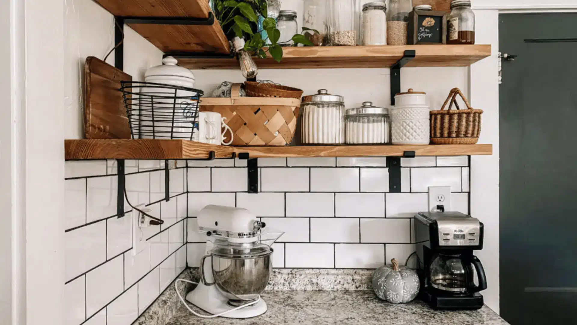 Farmhouse kitchen with open shelves and neatly arranged dishes