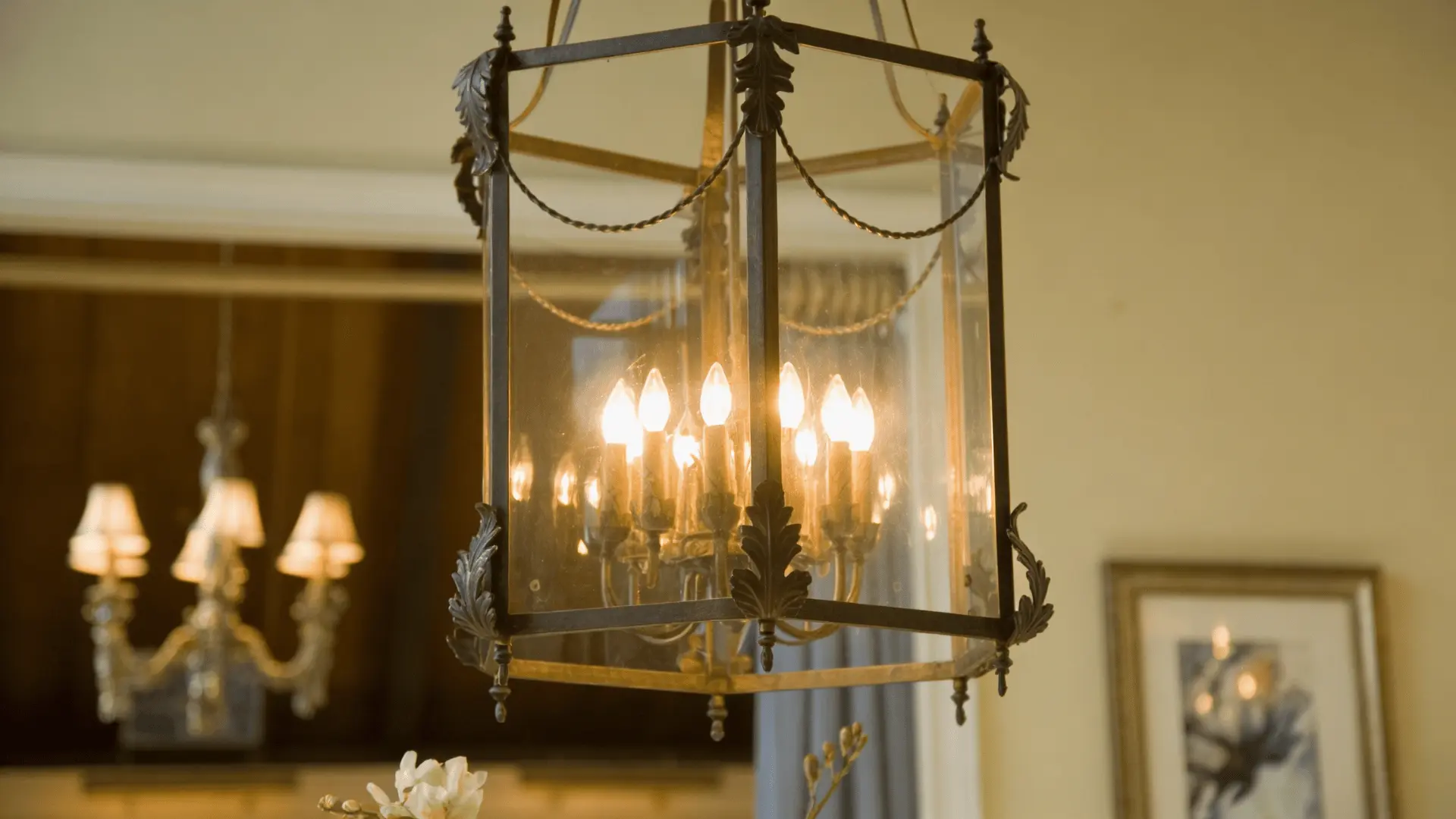 Statement chandelier hanging light in soft rustic living room