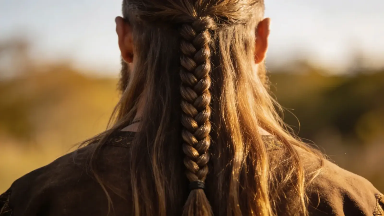 Long hair with a single braid down the center of the back (1)