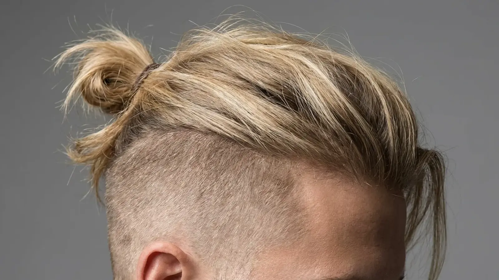 Short sides with longer hair on top showing an undercut hairstyle