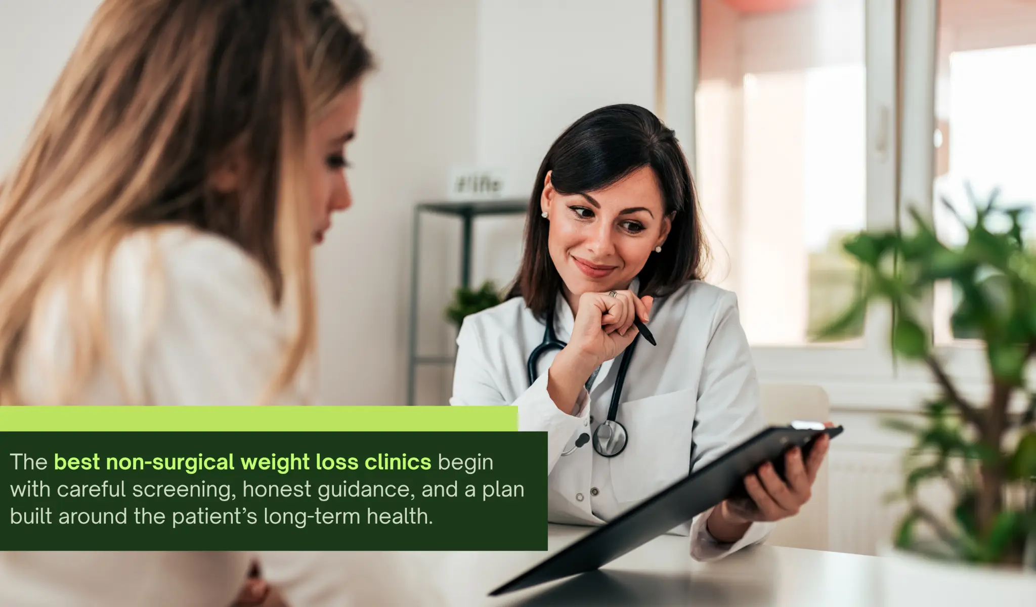 Doctor consulting with patient in bright office setting with plants in background