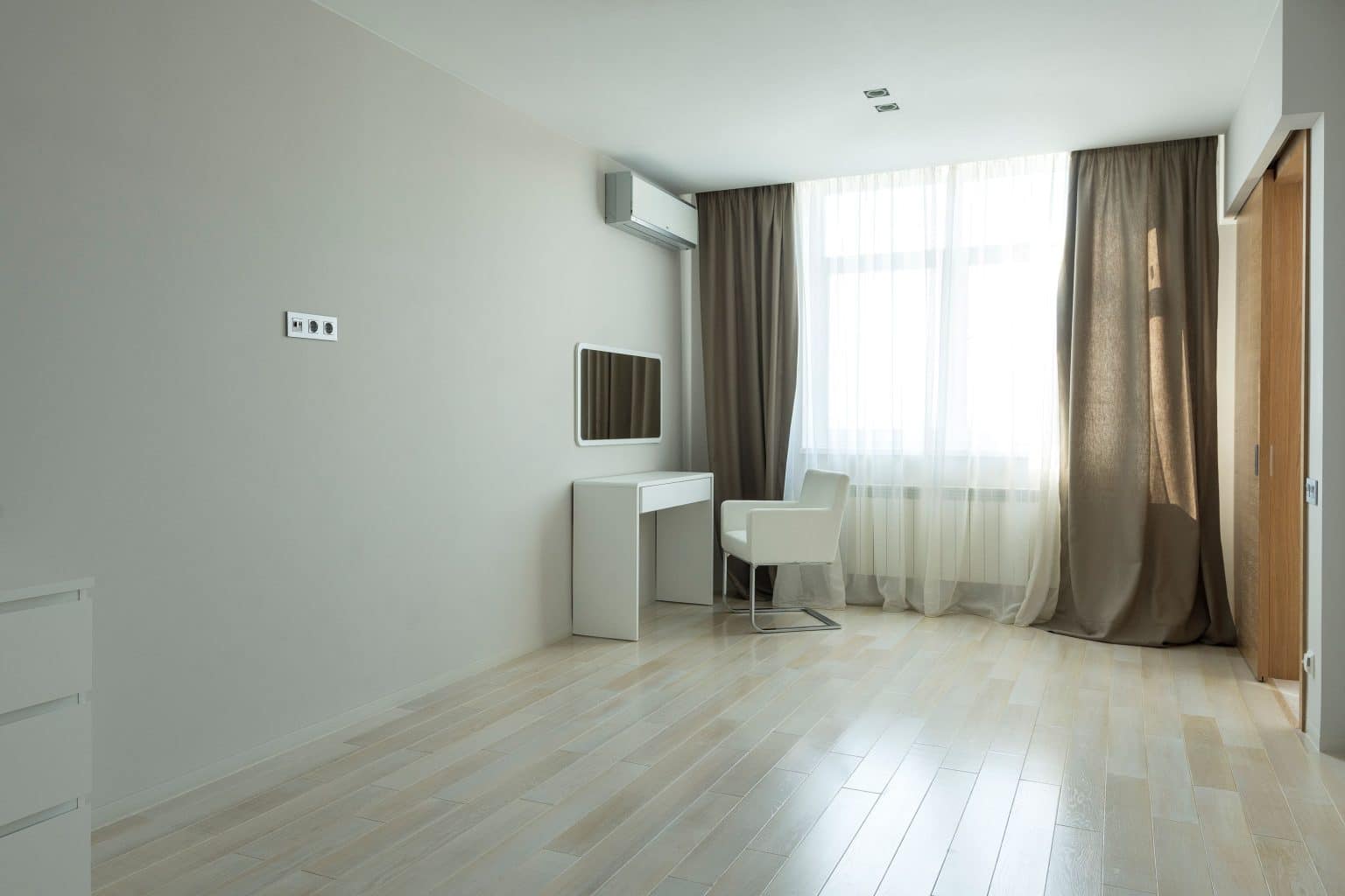 How to Design Clean, Minimalist Walls Without Sacrificing Utility and Maintenance Access