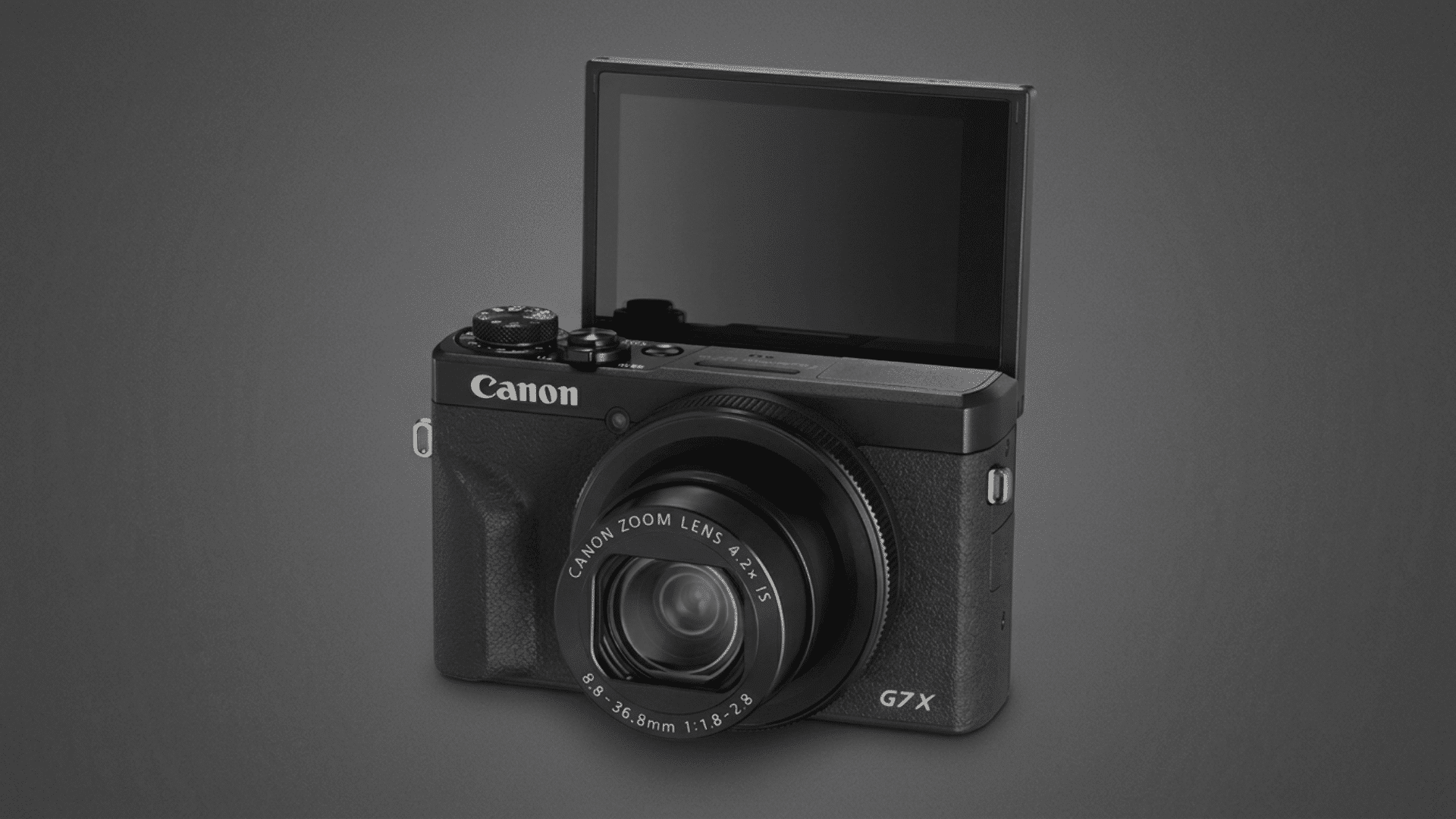 Canon PowerShot G7 X Mark III compact camera with flip screen and zoom lens.