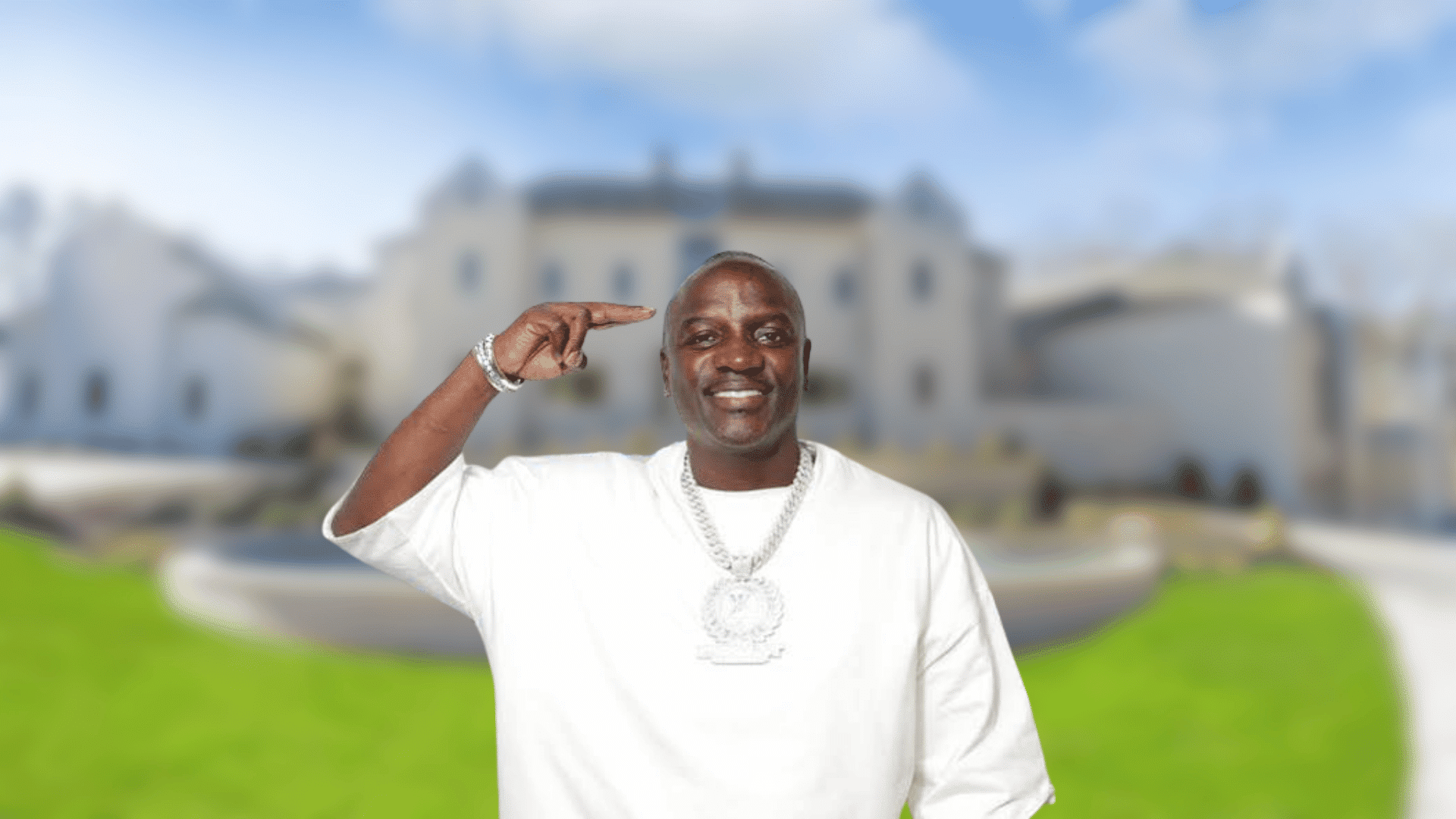Akon posing beside a luxury sports car with a large mansion in the background.