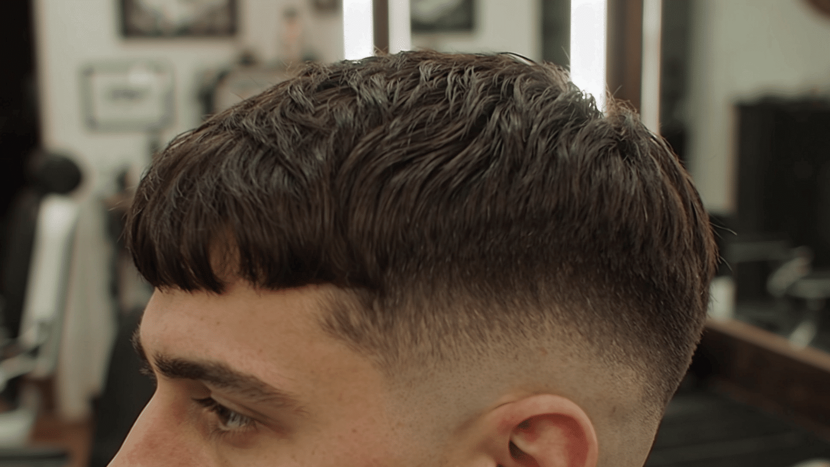 Short Caesar haircut with a straight fringe and evenly trimmed sides
