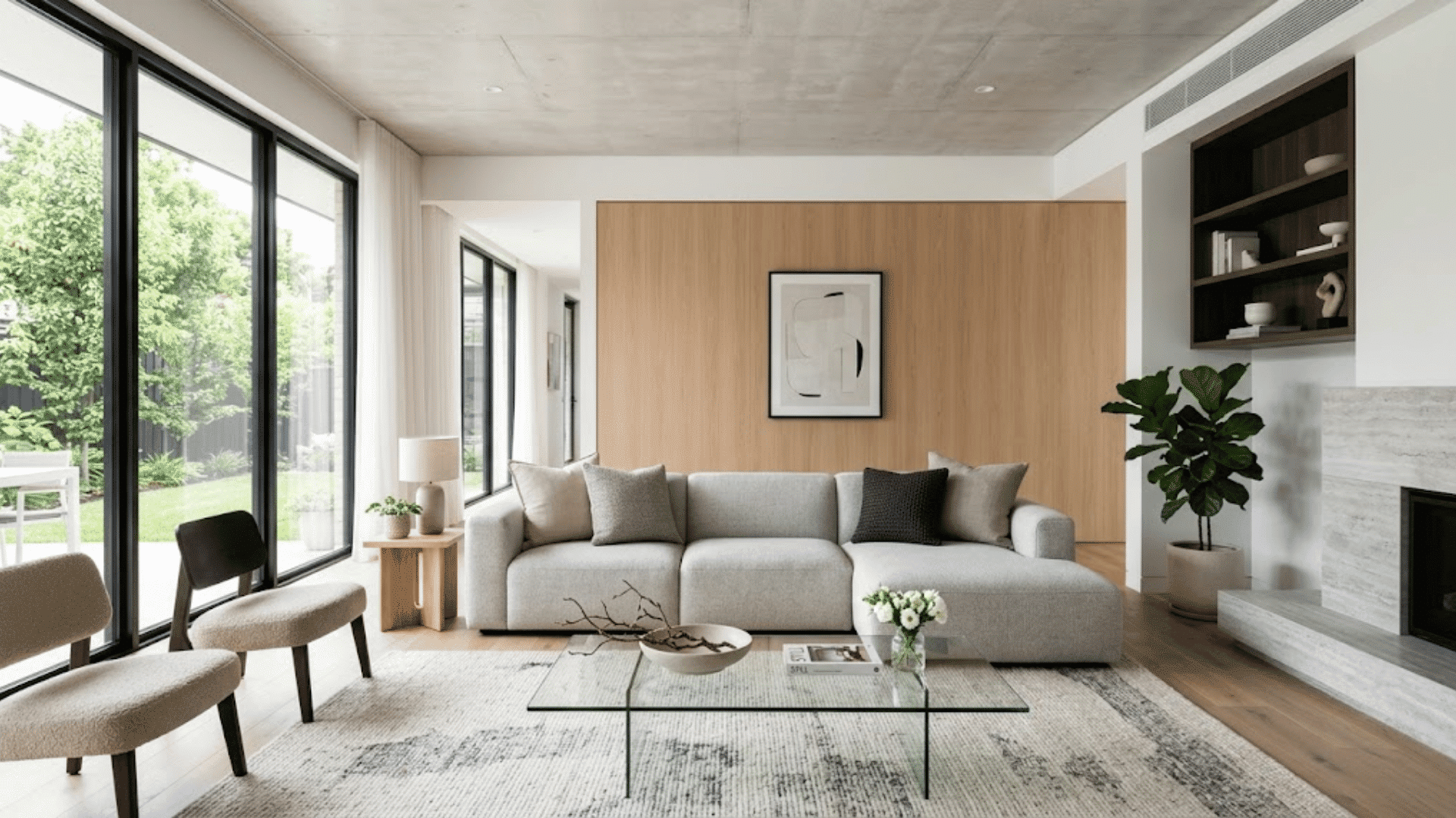 Contemporary living room showcasing modern interior design styles with clean lines, neutral tones, and textured decor elements.
