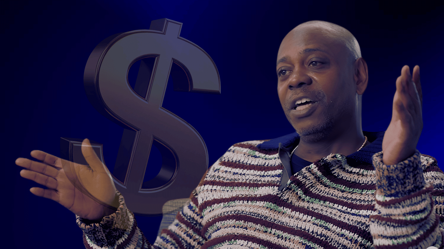 Dave Chappelle speaking with hands raised against a dark blue background with a dollar symbol graphic.