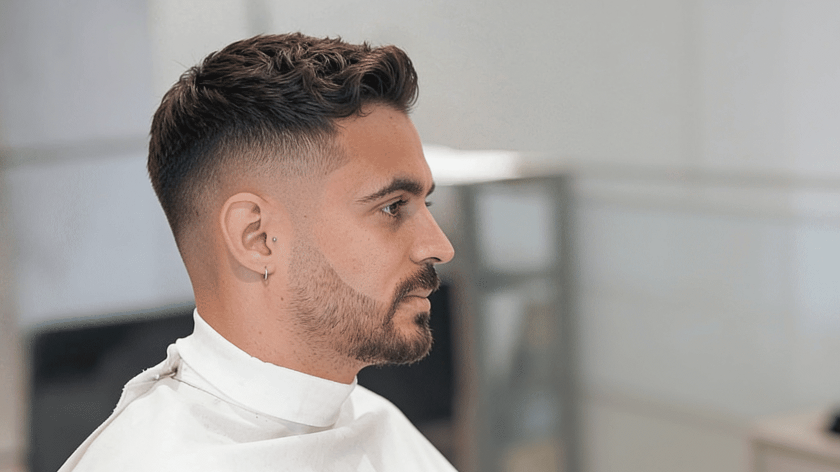 French crop haircut with a textured fringe and short tapered sides