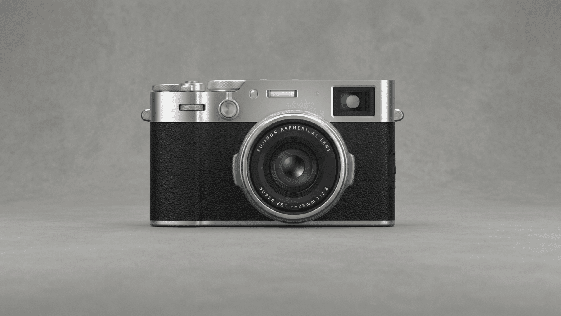 Fujifilm X100VI compact camera with fixed lens displayed on a gray background.