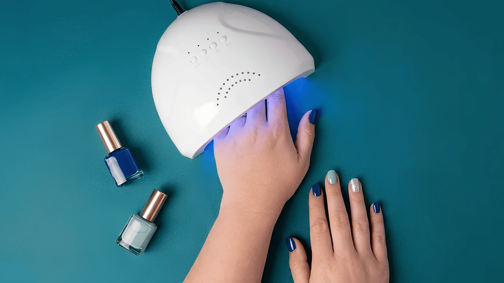 hand-under-uv-nail-lamp
