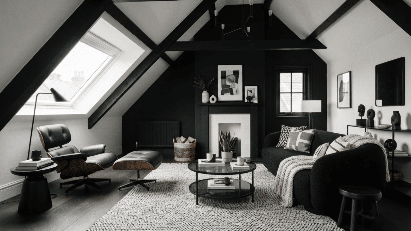 Modern black and white attic room with contrast décor, stylish furniture, and balanced lighting.