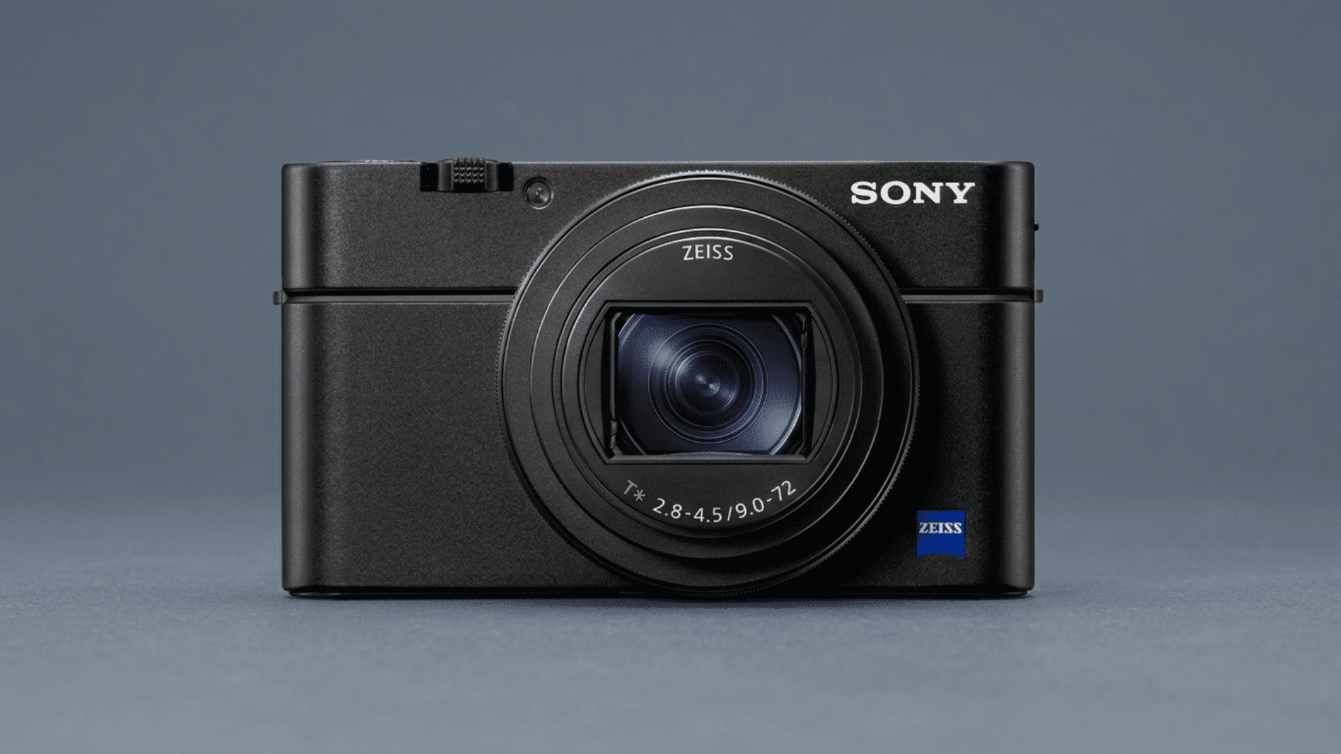 Sony RX100 VII compact camera with Zeiss zoom lens displayed on a blue background.