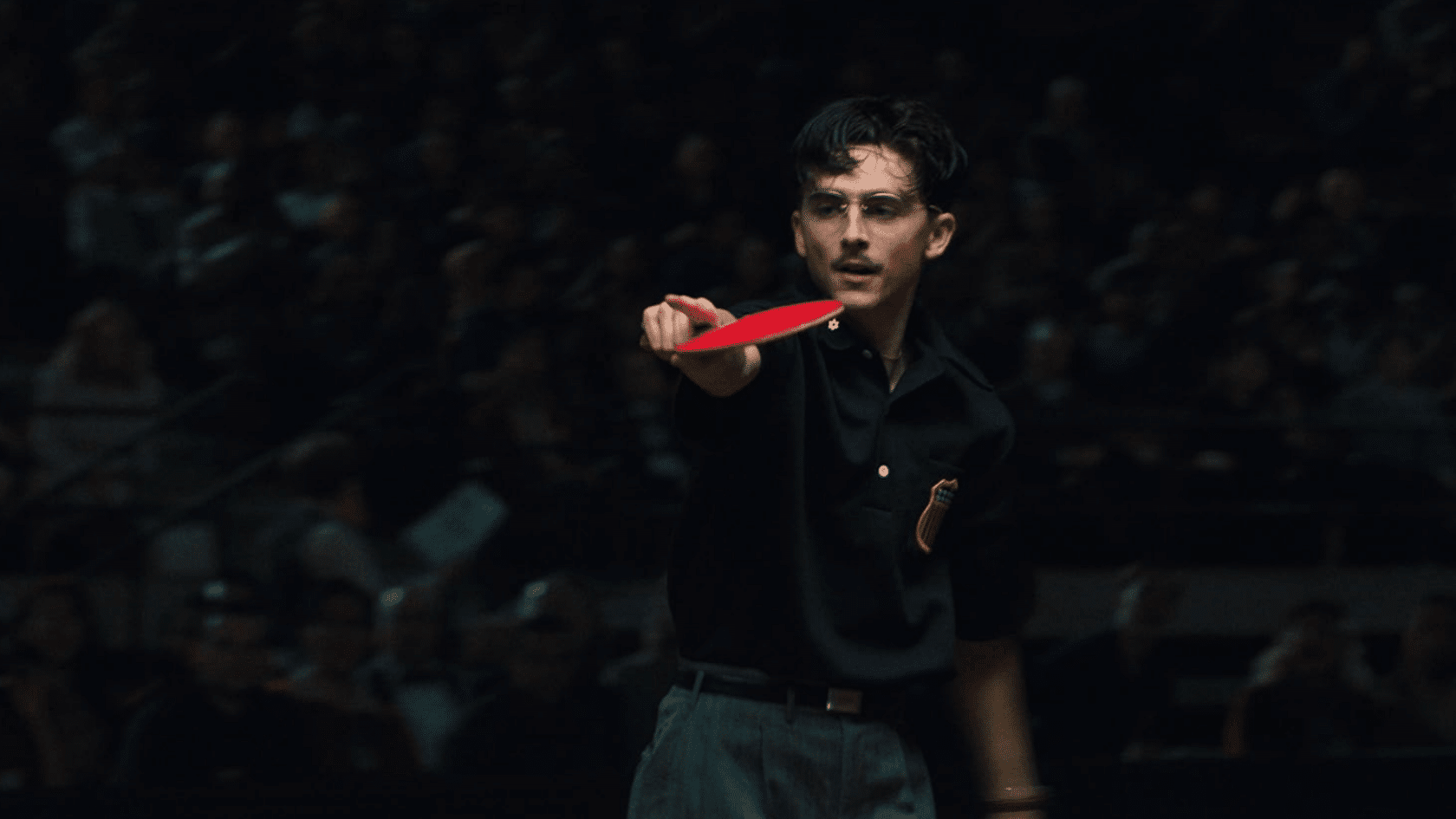 Timothée Chalamet portraying table tennis player Marty Mauser in the sports drama film Marty Supreme.