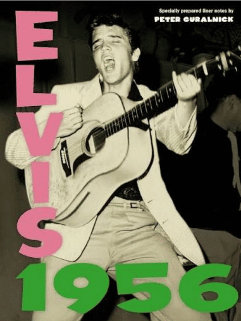 Elvis Presley album cover showing Elvis singing while playing an acoustic guitar.