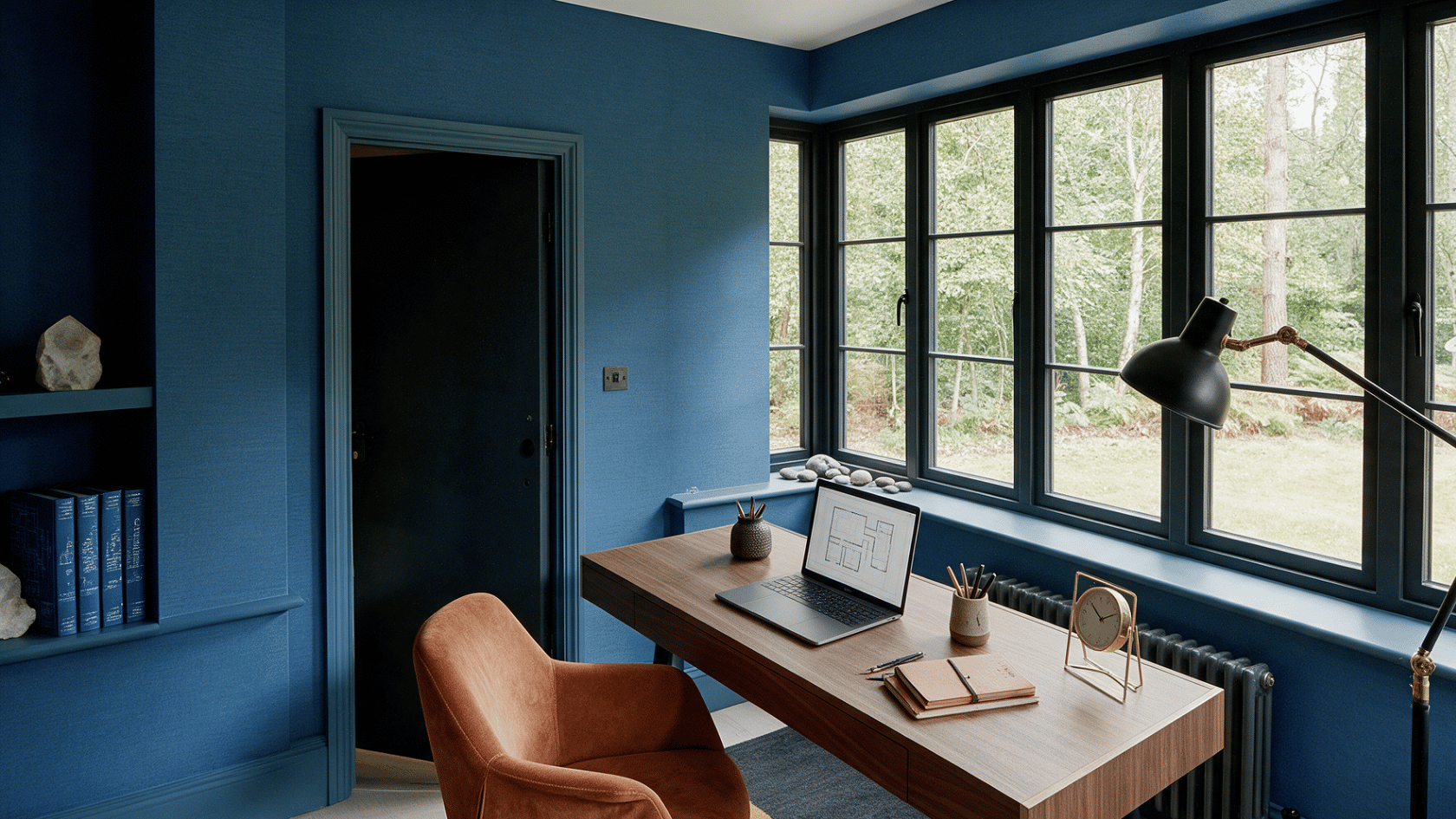 Desk chair placed against a solid wall for support in a balanced Feng Shui office layout.