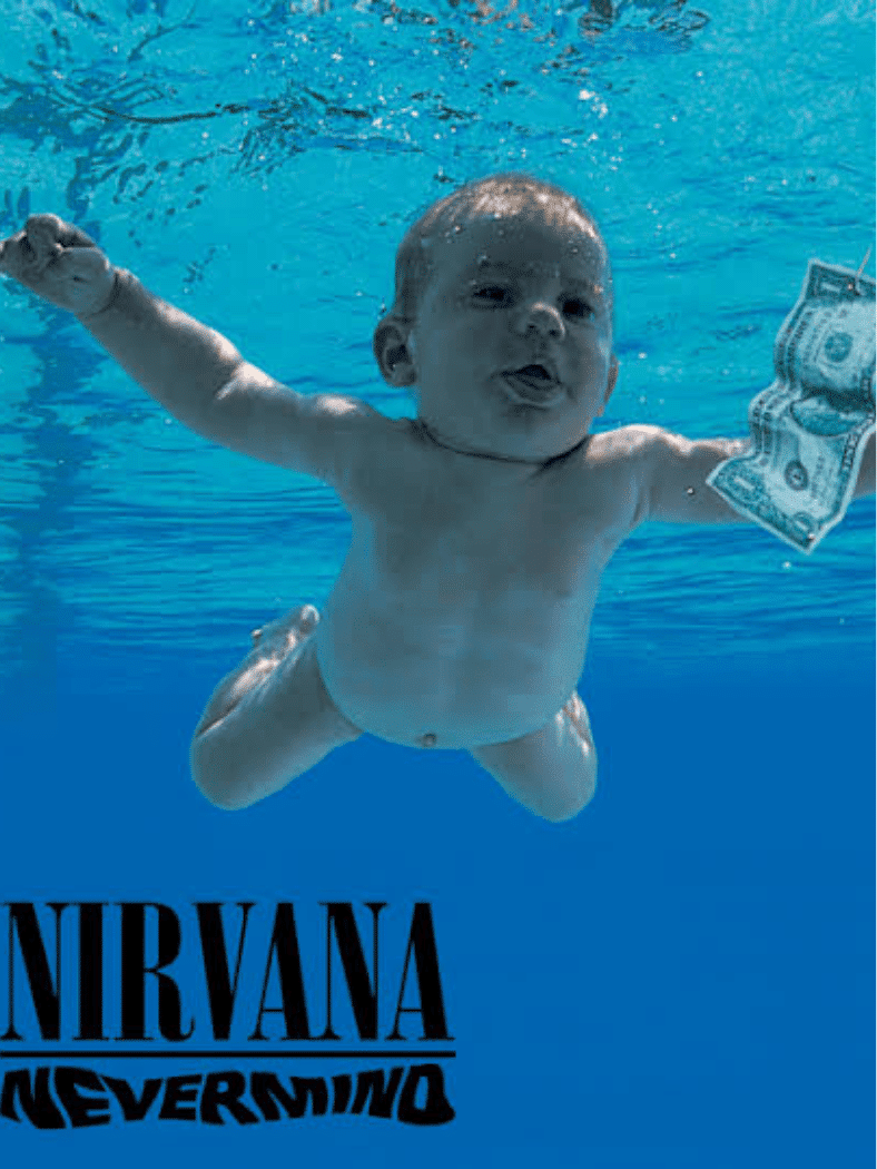 Nirvana โ Nevermind album cover showing a baby swimming underwater toward a dollar bill.