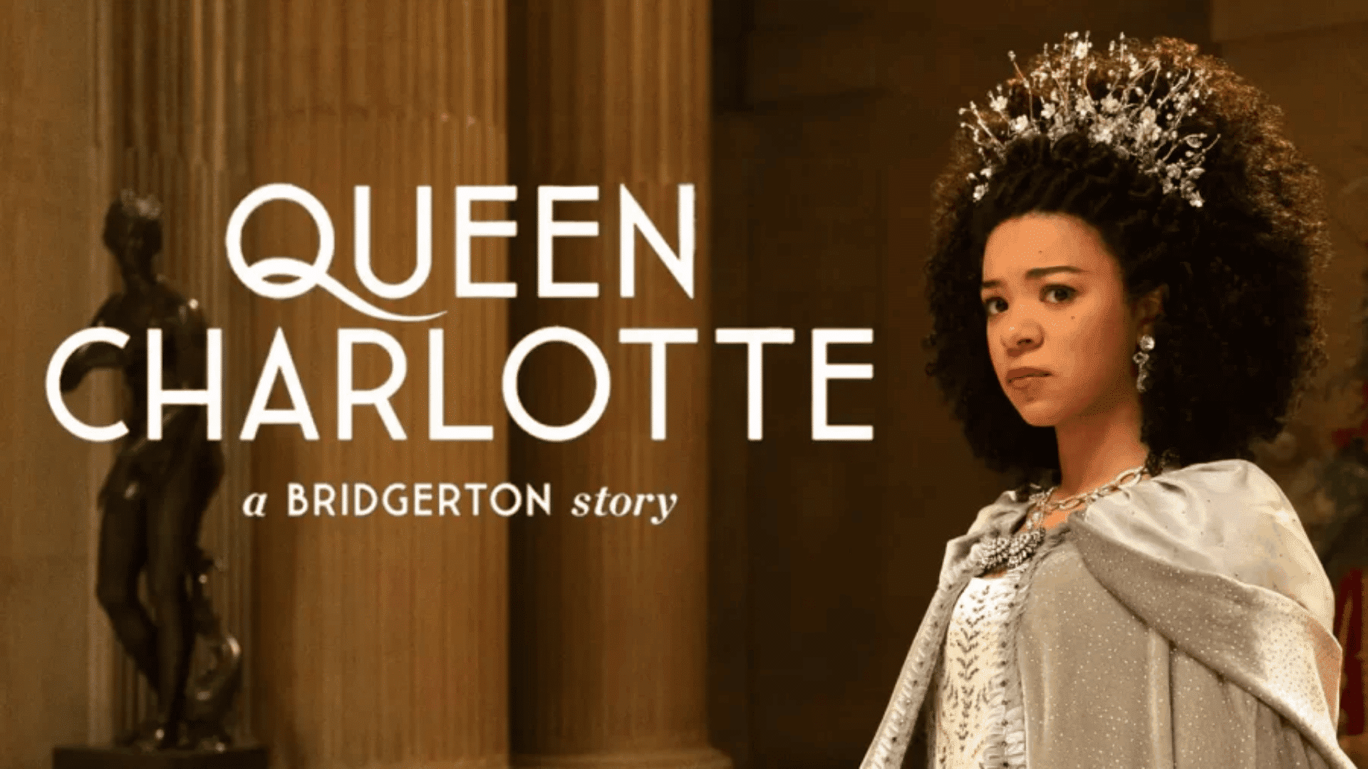 Queen Charlotte poster showing a woman in a crown and royal dress with text “QUEEN CHARLOTTE a BRIDGERTON story”